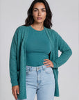 Cardigan aus Lammwolle mit Schalkragen und Melange-Optik
